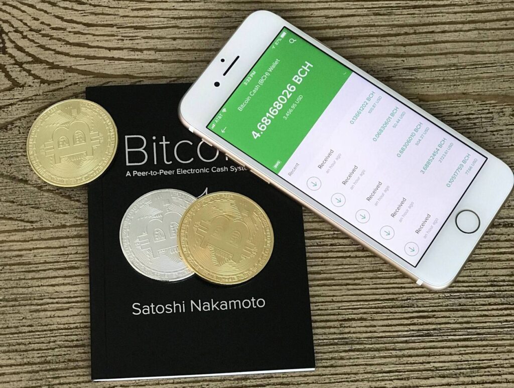 https://upload.wikimedia.org/wikipedia/commons/3/3d/Bitcoin_Cash_wallet_and_whitepaper.jpg